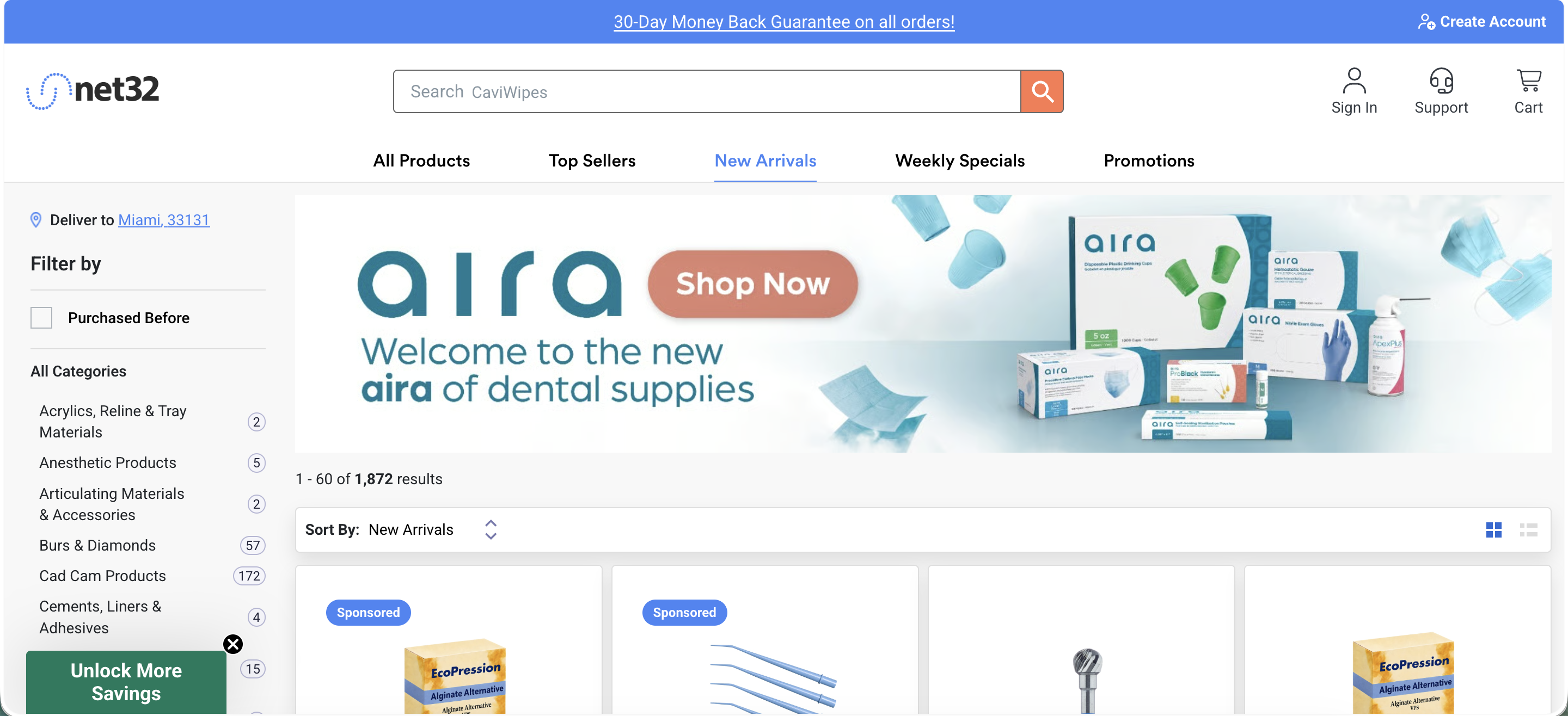 Net32 'New Arrivals' tab, showing a different vendor banner ad and 1,872 results sorted by New Arrivals.